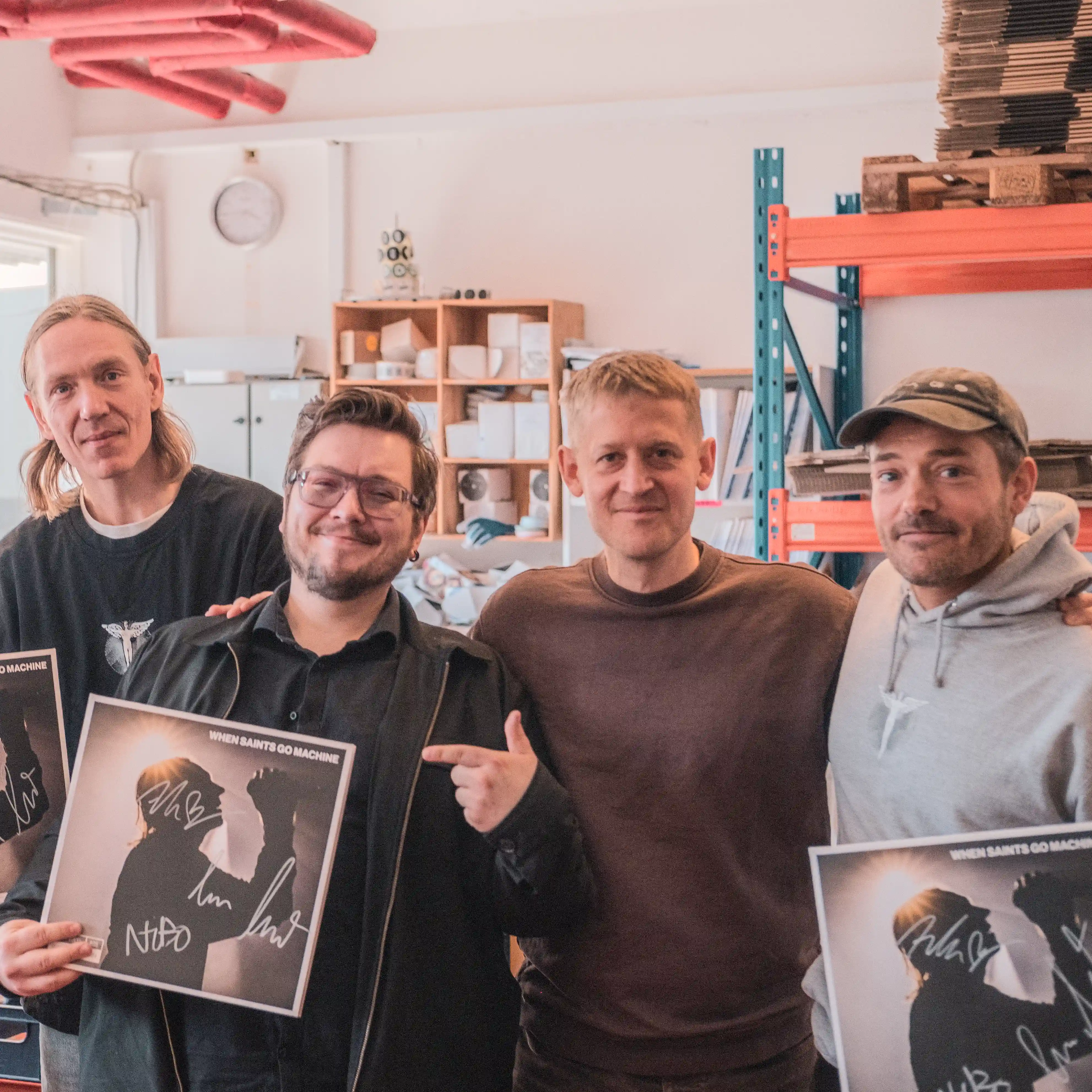 A photograph of Gudmundur with the Danish band, When Saints Go Machine