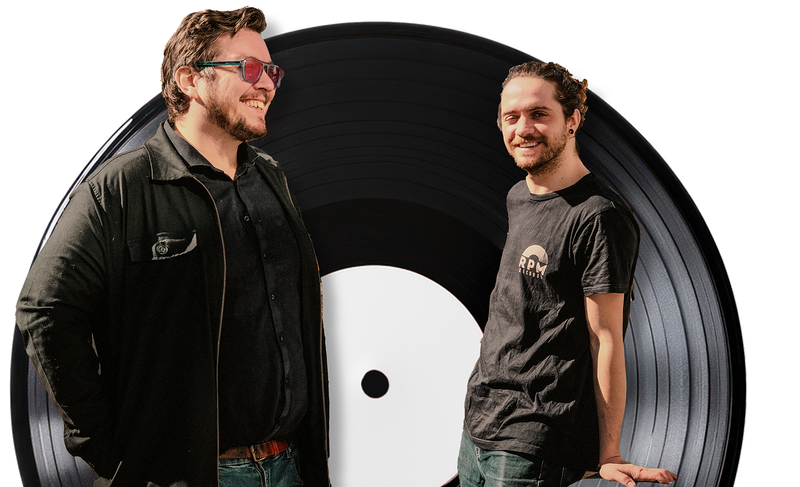 Image of Gudmundur and Mathias in front of a vinyl record