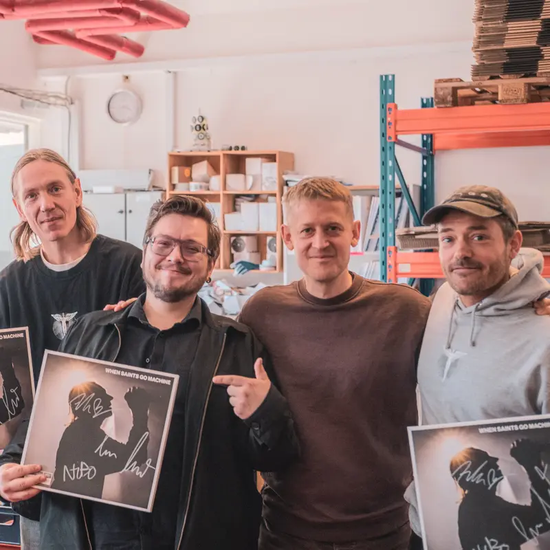 A photograph of Gudmundur with the Danish band, When Saints Go Machine